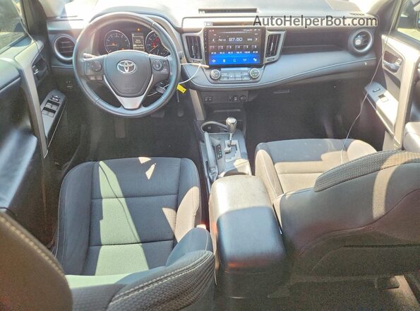 2T3RFREV0GW444922 2016 TOYOTA RAV4 Black Widok deski rozdzielczej