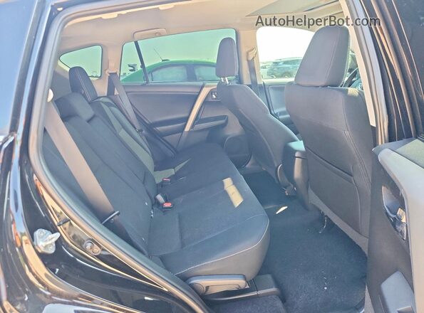 2T3RFREV0GW444922 2016 TOYOTA RAV4 Black Widok tylnych siedzeń