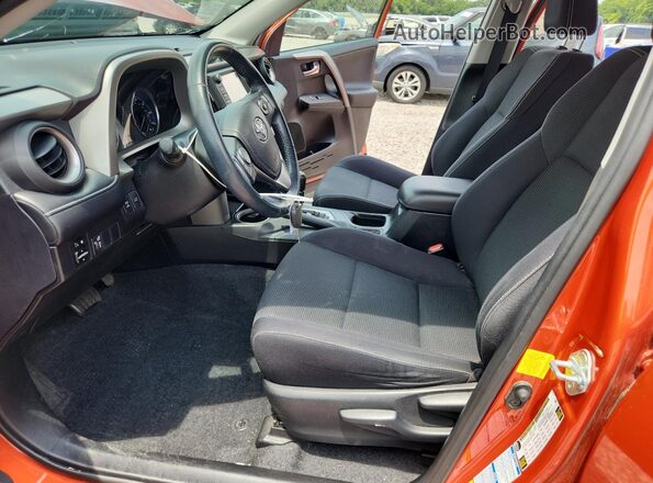 2T3RFREV0GW499208 2016 TOYOTA RAV4 Orange Widok wnętrza z przodu