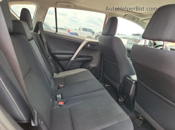 2T3RFREV0GW499208 2016 TOYOTA RAV4 Orange Widok wnętrza z tyłu