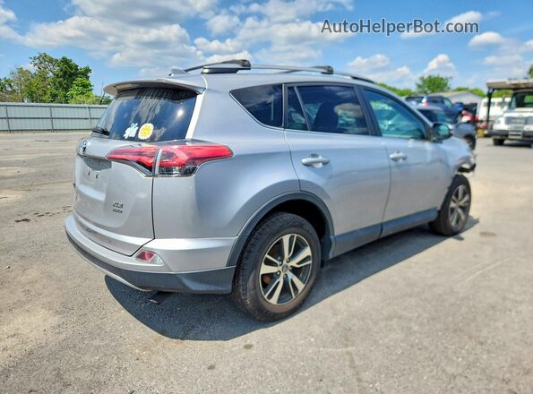 2T3RFREV0JW775183 2018 TOYOTA RAV4 Серебряный Задняя правая четверть
