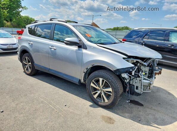 2T3RFREV0JW775183 2018 TOYOTA RAV4 Серебряный Передняя правая четверть