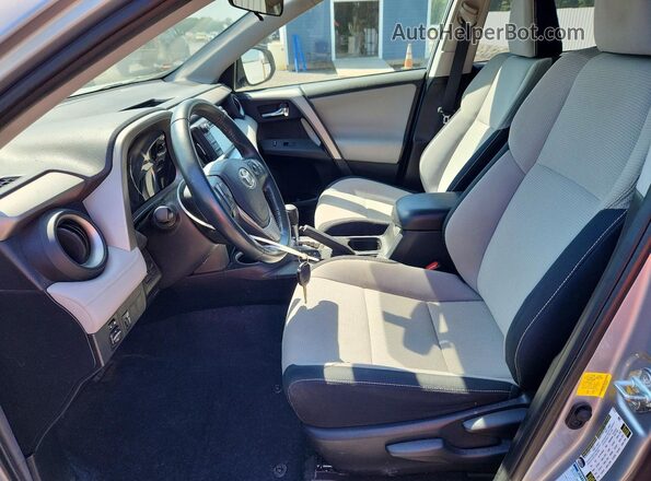 2T3RFREV1GW448929 2016 TOYOTA RAV4 Silver Вид салону спереду