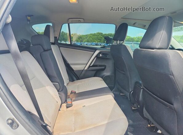 2T3RFREV1GW469523 2016 TOYOTA RAV4 Серебряный Вид задней части салона