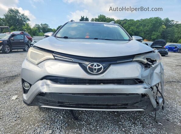 2T3RFREV1GW469523 2016 TOYOTA RAV4 Серебряный Вид спереди