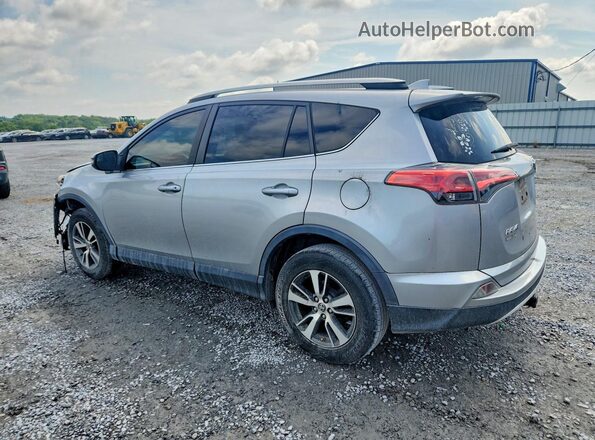 2T3RFREV1GW469523 2016 TOYOTA RAV4 Серебряный Задняя левая четверть