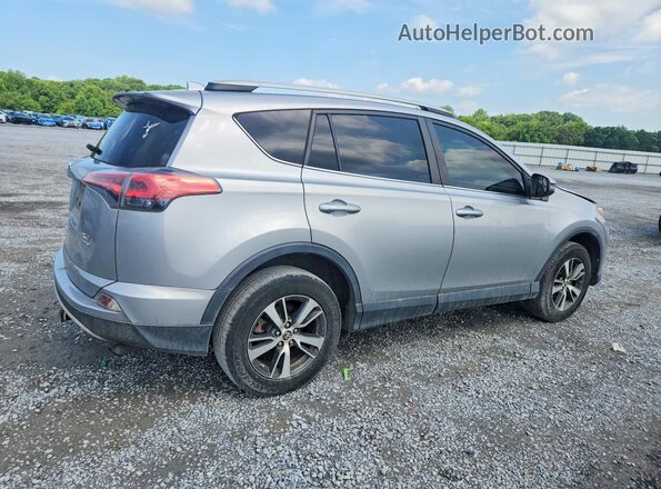 2T3RFREV1GW469523 2016 TOYOTA RAV4 Серебряный Задняя правая четверть