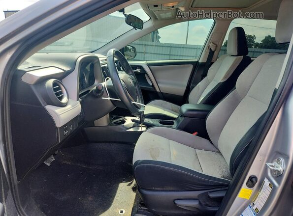 2T3RFREV1GW469523 2016 TOYOTA RAV4 Серебряный Вид салона спереди