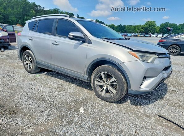 2T3RFREV1GW469523 2016 TOYOTA RAV4 Серебряный Передняя правая четверть