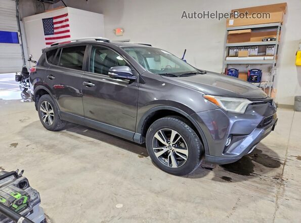 2T3RFREV1GW507400 2016 TOYOTA RAV4 Gray Front right