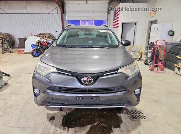 2T3RFREV1GW507400 2016 TOYOTA RAV4 Gray Front view