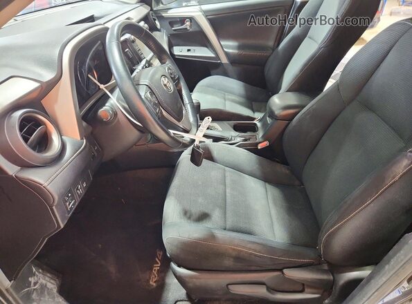 2T3RFREV1GW507400 2016 TOYOTA RAV4 Gray Front interior view