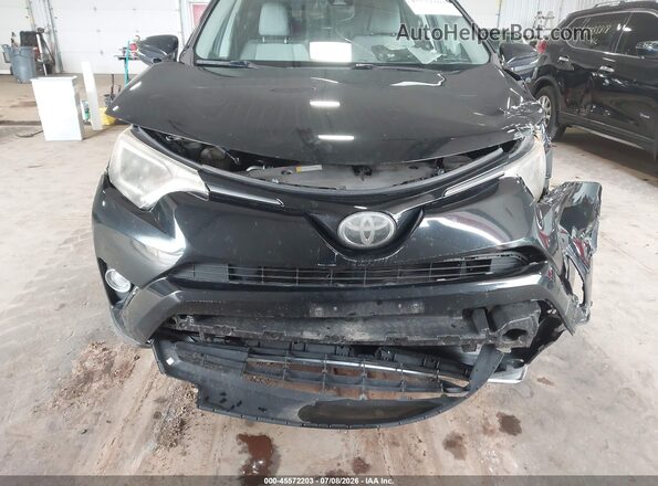 2T3RFREV1HW628283 2017 TOYOTA RAV4 Black Սարքավորումների վահանակի տեսք