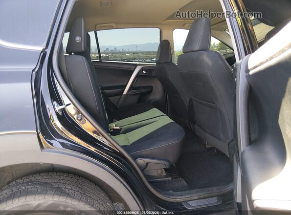 2T3RFREV1JW762040 2018 TOYOTA RAV4 Black VIN կոդի պիտակի տեսք