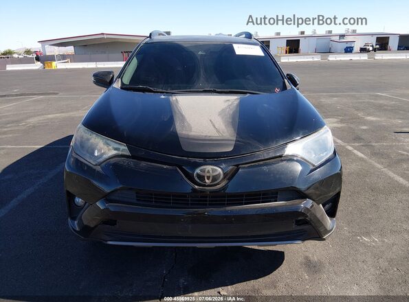2T3RFREV1JW762040 2018 TOYOTA RAV4 Black Սալոնի հետևի տեսք