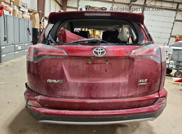 2T3RFREV1JW794132 2018 TOYOTA RAV4 Red Vista trasera