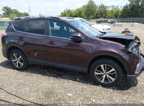 2T3RFREV1JW851994 2018 TOYOTA RAV4 Burgundy Вид задньої частини салону