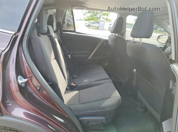 2T3RFREV2GW522052 2016 TOYOTA RAV4 Brown Rear interior view