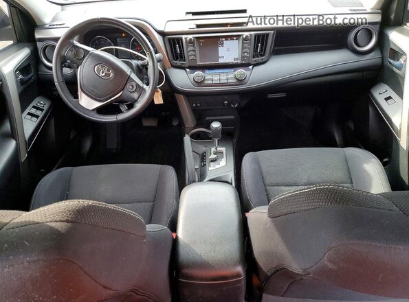 2T3RFREV2GW522052 2016 TOYOTA RAV4 Brown Dashboard view