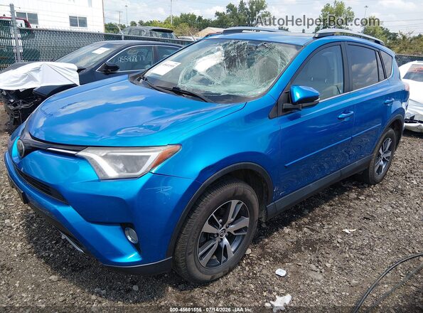 2T3RFREV2HW598811 2017 TOYOTA RAV4 Blue Vista tres cuartos delantera izquierda