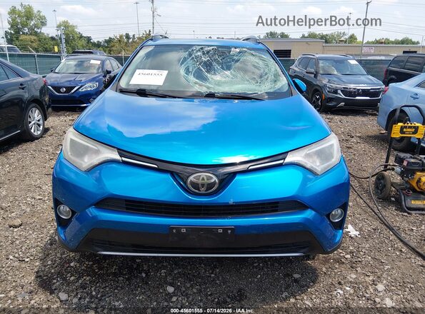 2T3RFREV2HW598811 2017 TOYOTA RAV4 Blue Vista interior trasera