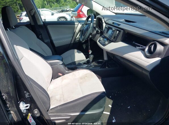 2T3RFREV2HW662541 2017 TOYOTA RAV4 Black წინა სალონის ხედი