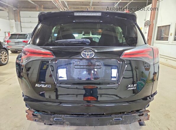 2T3RFREV2JW831270 2018 TOYOTA RAV4 Black Vista trasera