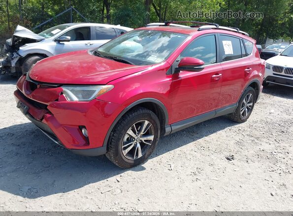 2T3RFREV3GW446485 2016 TOYOTA RAV4 Red Vista tres cuartos delantera izquierda