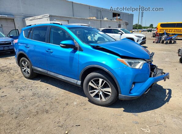 2T3RFREV3GW476666 2016 TOYOTA RAV4 Blue Передня права чверть