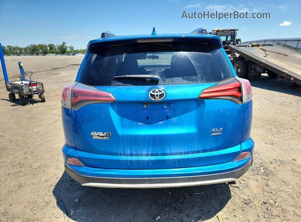 2T3RFREV3GW476666 2016 TOYOTA RAV4 Blue Вид ззаду