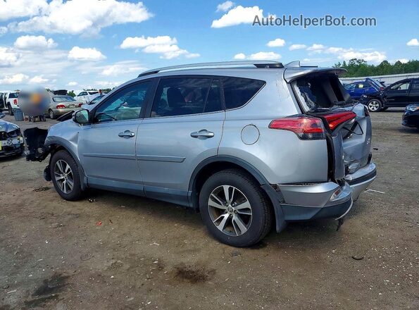 2T3RFREV3GW503459 2016 TOYOTA RAV4 Silver Rear left