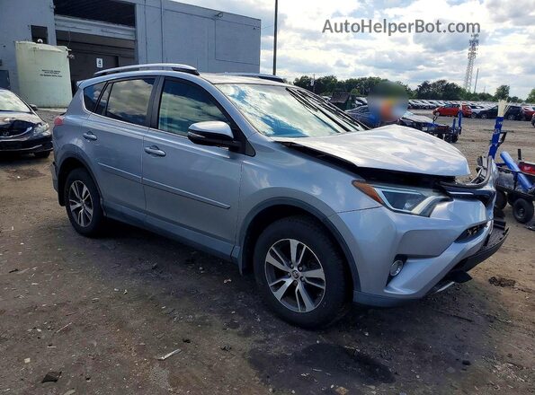 2T3RFREV3GW503459 2016 TOYOTA RAV4 Silver Front right