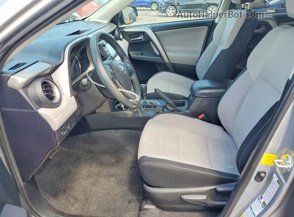 2T3RFREV3GW503459 2016 TOYOTA RAV4 Silver Front interior view