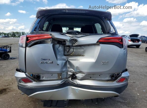 2T3RFREV3GW503459 2016 TOYOTA RAV4 Silver Rear view
