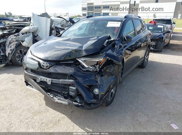 2T3RFREV3HW544076 2017 TOYOTA RAV4 Black Front left
