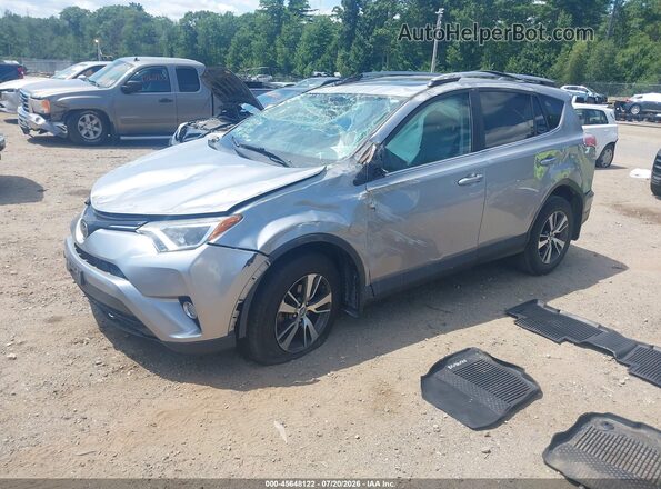 2T3RFREV3HW633873 2017 TOYOTA RAV4 Silver Առջևի ձախ երեք քառորդ տեսարան