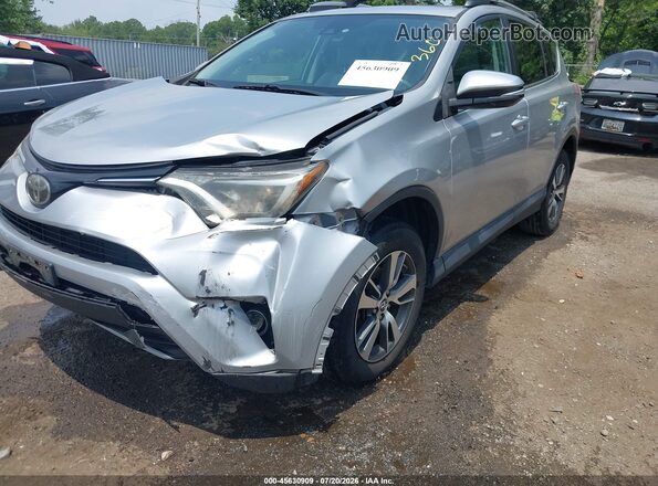 2T3RFREV3JW751704 2018 TOYOTA RAV4 Silver Դիմացի տեսք