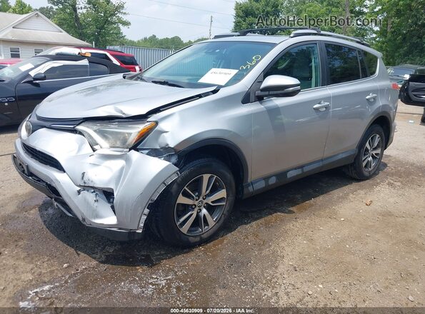 2T3RFREV3JW751704 2018 TOYOTA RAV4 Silver Առջևի ձախ երեք քառորդ տեսարան