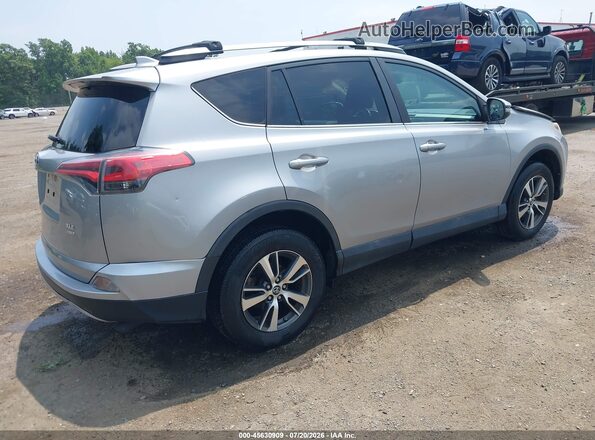 2T3RFREV3JW751704 2018 TOYOTA RAV4 Silver Հետևի աջ