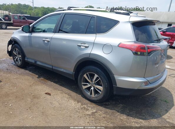 2T3RFREV3JW751704 2018 TOYOTA RAV4 Silver Հետևի ձախ