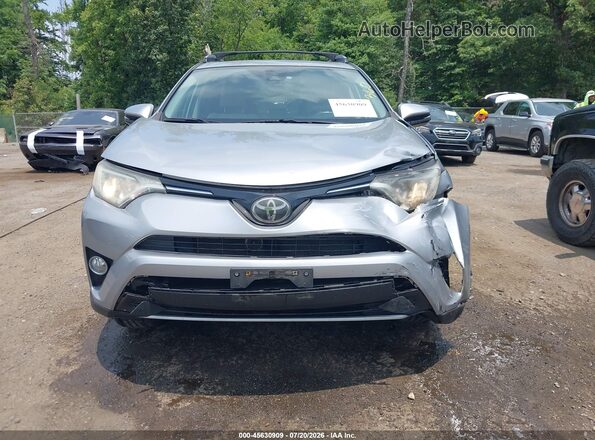 2T3RFREV3JW751704 2018 TOYOTA RAV4 Silver Սարքավորումների վահանակի տեսք