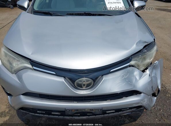 2T3RFREV3JW751704 2018 TOYOTA RAV4 Silver Հետևի տեսք