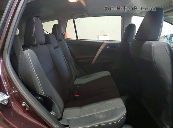 2T3RFREV3JW787392 2018 TOYOTA RAV4 Burgundy Widok wnętrza z tyłu