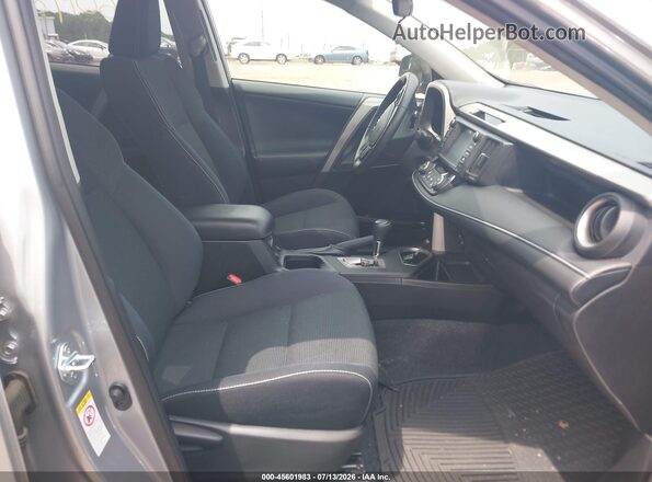 2T3RFREV4GW486526 2016 TOYOTA RAV4 Silver Widok wnętrza z przodu