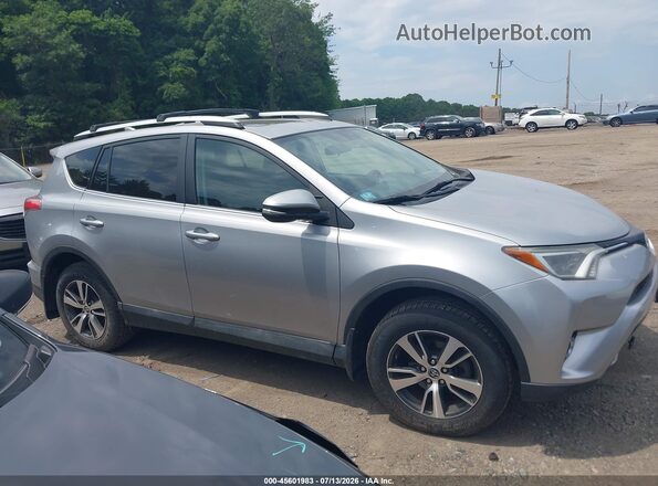 2T3RFREV4GW486526 2016 TOYOTA RAV4 Silver Widok wnętrza z tyłu