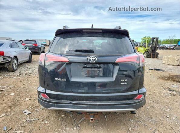2T3RFREV4HW577913 2017 TOYOTA RAV4 Black Vista trasera