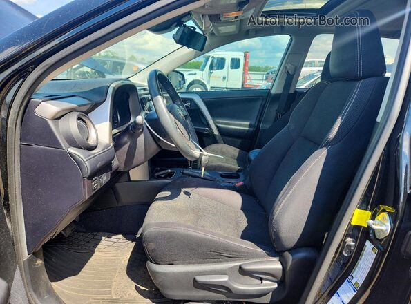 2T3RFREV4HW643926 2017 TOYOTA RAV4 Black წინა სალონის ხედი