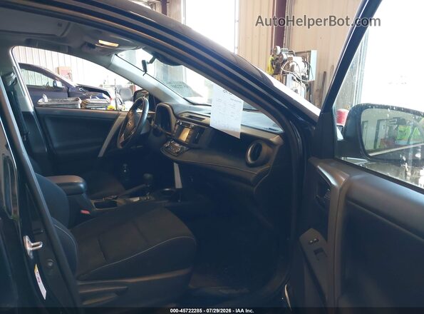 2T3RFREV4JW750707 2018 TOYOTA RAV4 Черный Вид салона спереди