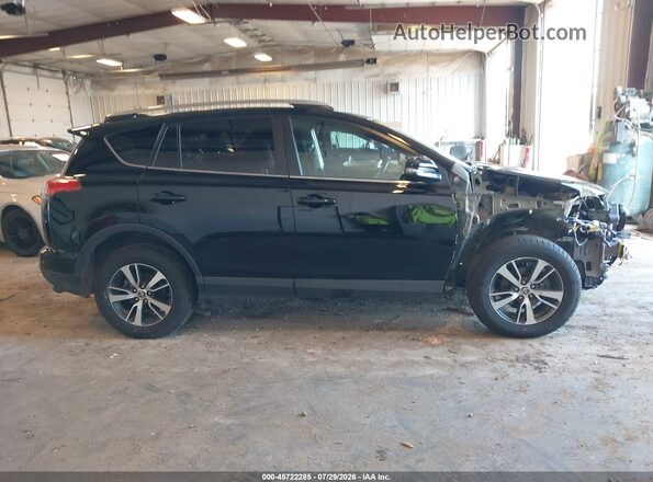2T3RFREV4JW750707 2018 TOYOTA RAV4 Черный Вид задней части салона