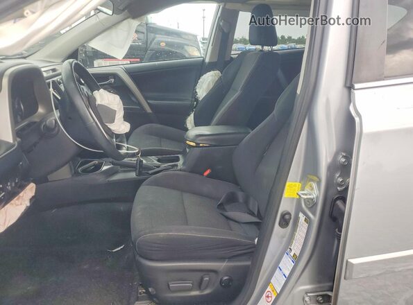 2T3RFREV4JW755406 2018 TOYOTA RAV4 Silver Widok wnętrza z przodu